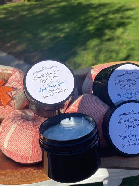 Crepe Lotion for Men. Sandalwood and Rose Patchouli. Beautiful black jars with screw on lids.