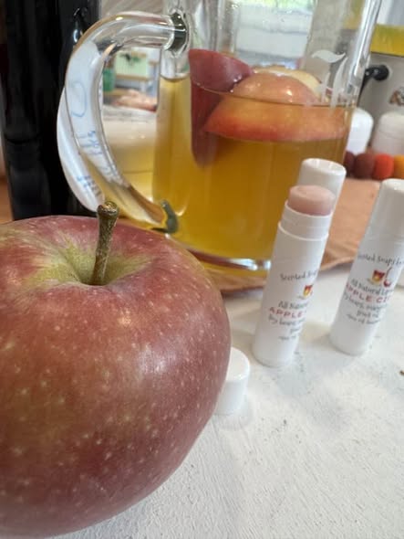 Lip Balm. Apple-Cider. Apple with a slight tint mixed with Cider, mango butter, local beeswax, soy bean, apple fruit.