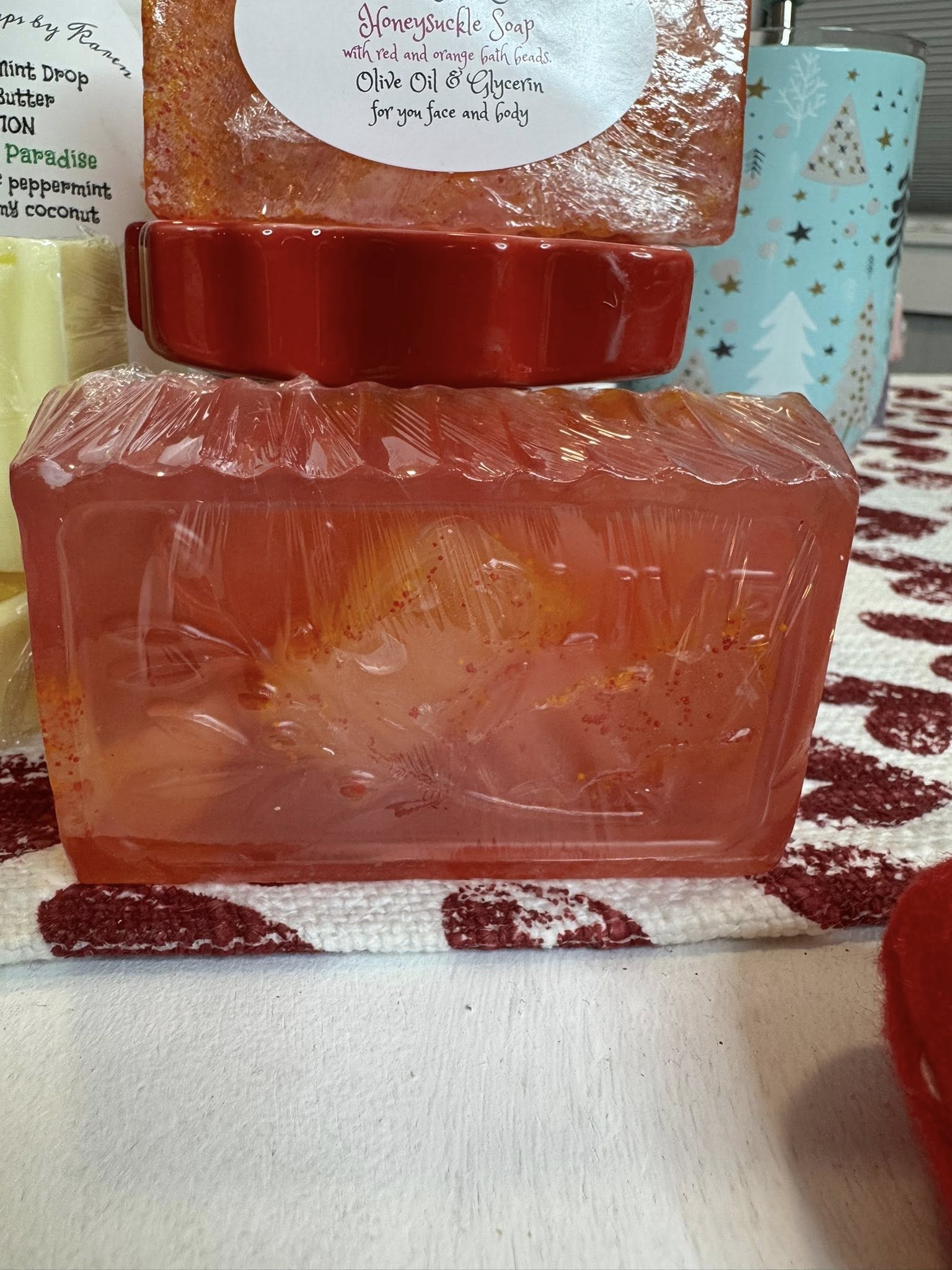 Honeysuckle Soap. NEW LOOK. Filled with red and orange bath beads. So tiny, a punch of power when you want to exfoliate and soft as butter.