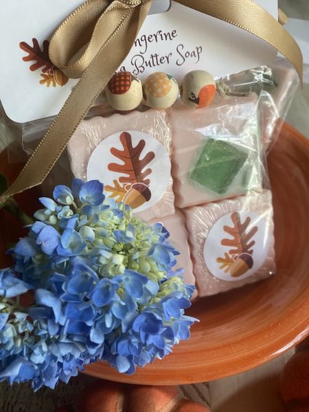 Tangerine Guest Soap Gift Set. The scent is delicious. A freshly cut orange. Four Guest Size bars. Pumpkin beads, Gold ribbon.