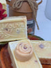 Autumn Apple Cider Soap for your face and body. Each bar has a rose shape soap in the center.