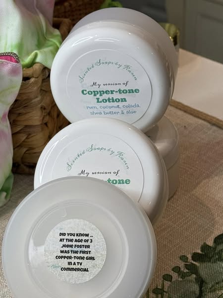 Copper-tone. Summertime Lotion with Shea Butter and Rosehip. Rum, colada, coconut.  Filled with essential oils, including Vitamin E.