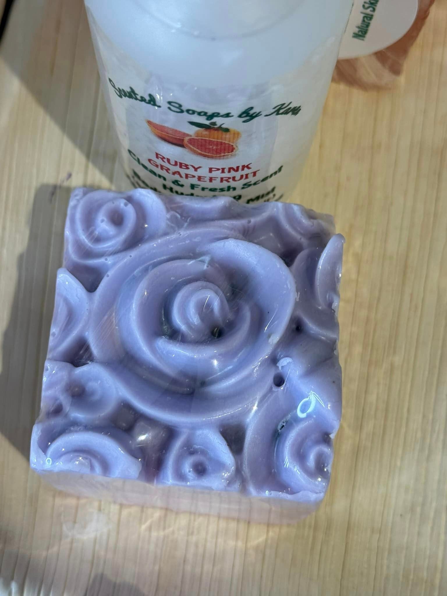 Grapefruit and Wild Concord Grape whipped floral soap. Made with Shea Butter and Glycerin.