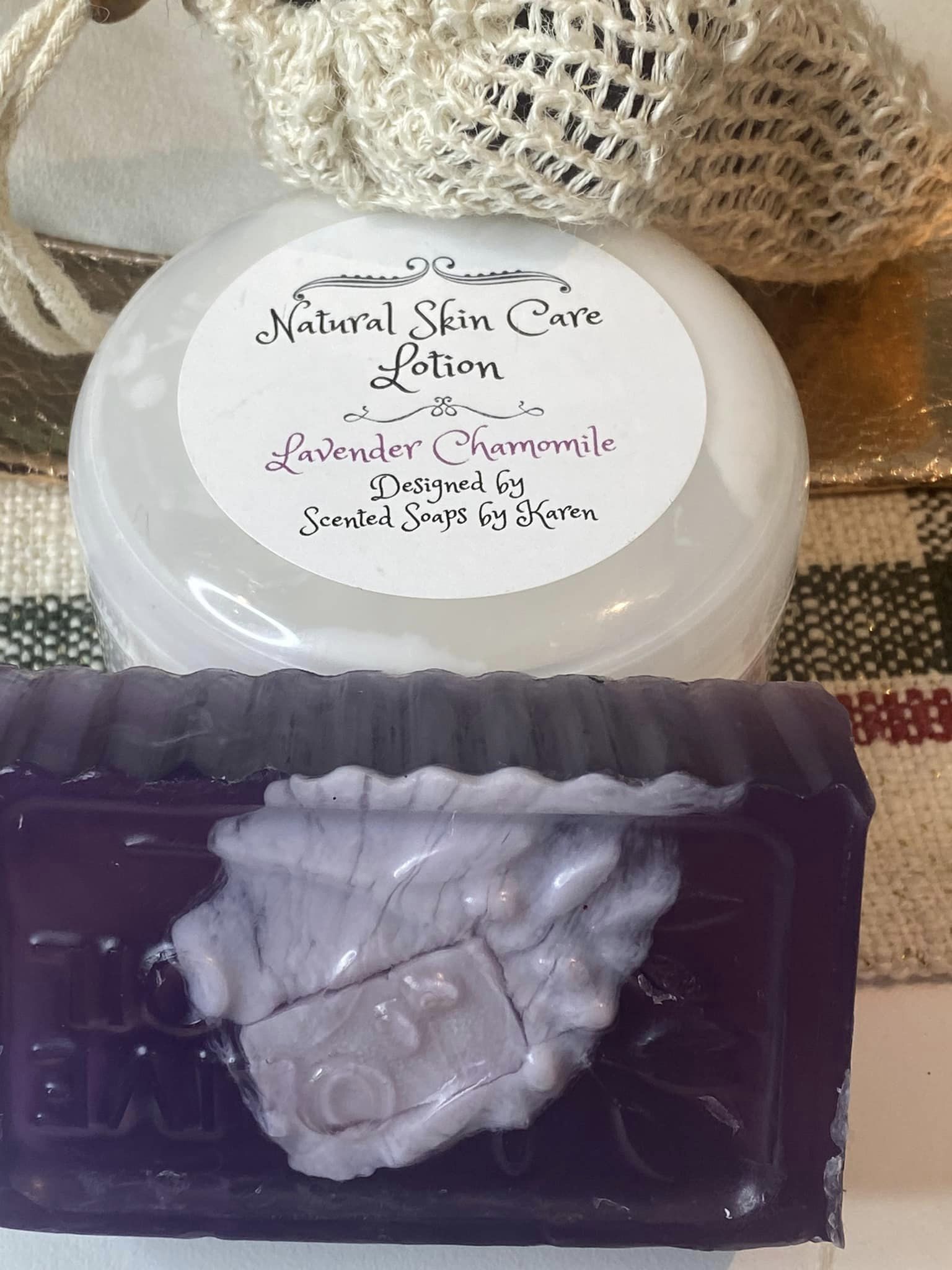 Lavender and Chamomile Lotion. Matching Soap. Sisal bag for easy exfoliating. All items are included in a zipped bag wrapped with ribbon.