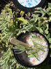 Bath Sea Salts. Lavender and Chamomile. Pink Himalayan salt. Black jars with wooden spoons.