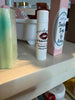 Pineapple and Tangerine Lip Balm. Pink boxes. Apple fruit, soy fruit, local beeswax.
