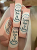 Pineapple and Tangerine Lip Balm. Pink boxes. Apple fruit, soy fruit, local beeswax.