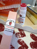 Strawberry Lip Balm (tinted) Apple fruit, soy fruit, local beeswax. Packed in pink boxes.