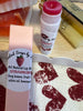 Strawberry Lip Balm (tinted) Apple fruit, soy fruit, local beeswax. Packed in pink boxes.