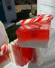 Peppermint and Orange with a splash of Candy Cane Soap. Olive Oil, Glycerin and Shea Butter.