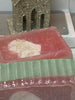 The Original Christmas Farm Inn and Spa SOAP. Olive Oil with Glycerin and a Shea Butter mitten in the center -- sprinkled with crushed oatmeal. Cinnamon and Cloves with an additional 6 essential oils.