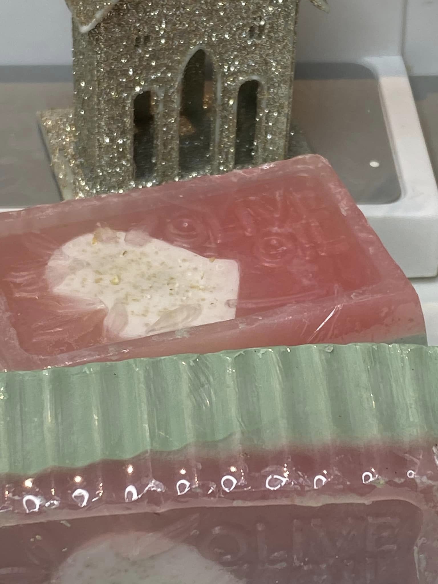 The Original Christmas Farm Inn and Spa SOAP. Olive Oil with Glycerin and a Shea Butter mitten in the center -- sprinkled with crushed oatmeal. Cinnamon and Cloves with an additional 6 essential oils.