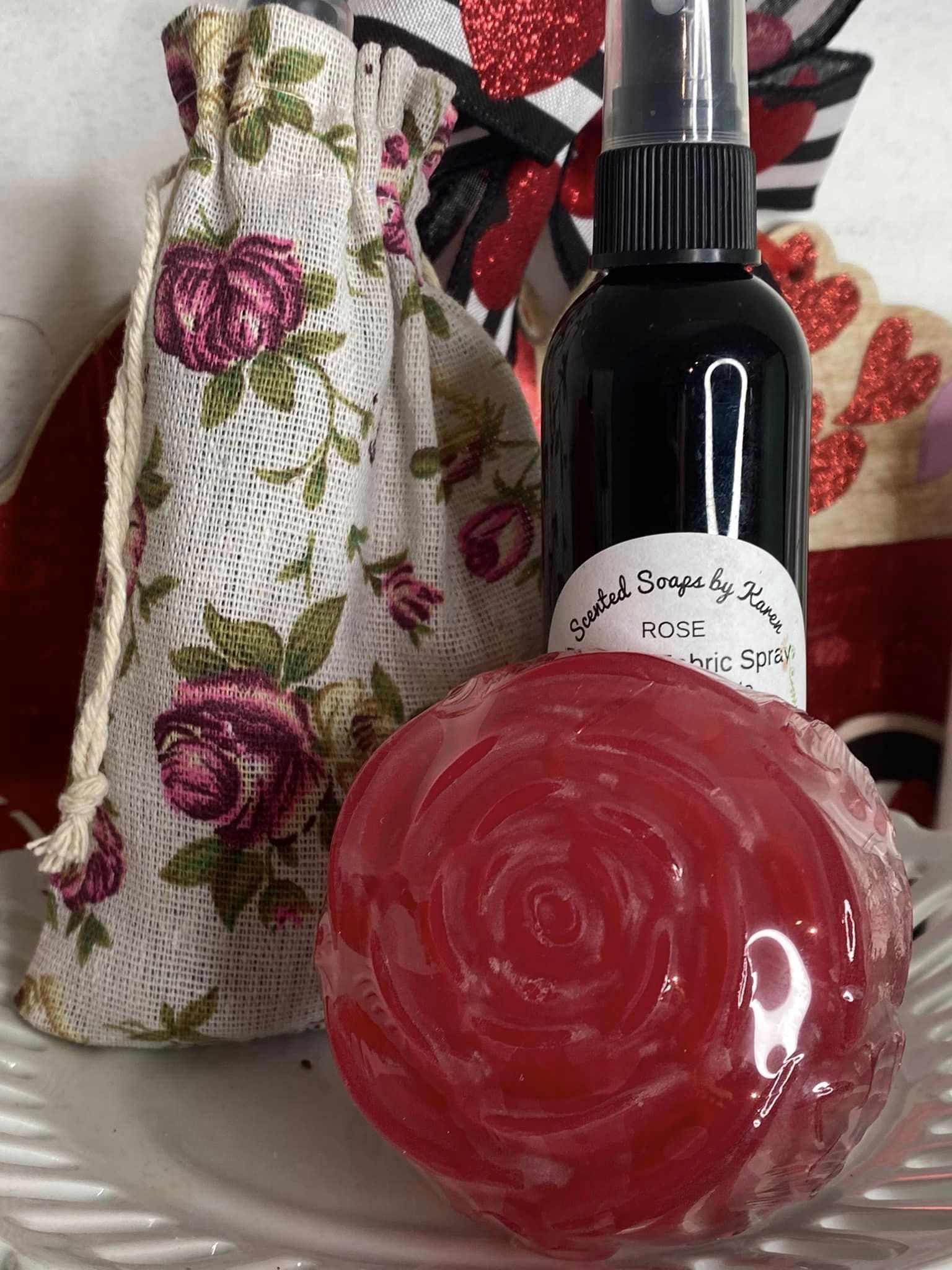 Rose Glycerin Soap. Rose Room and Fabric Natural Neutralizer Spray. Products are tucked into a rose burlap bag with ties.