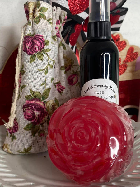 Rose Glycerin Soap. Rose Room and Fabric Natural Neutralizer Spray. Products are tucked into a rose burlap bag with ties.